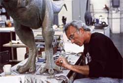 In this undated image released by Stan Winston Studio, Stan Winston is shown working on a dinosaur for the film, "Jurassic Park". Winston, the Oscar-winning special-effects maestro responsible for bringing the dinosaurs of "Jurassic Park" and other iconic movie creatures to life, has died. He was 62. He died at his home in Malibu surrounded by family on Sunday, June 15, 2008, after a seven-year struggle with multiple myeloma, according to a representative from Stan Winston Studio.